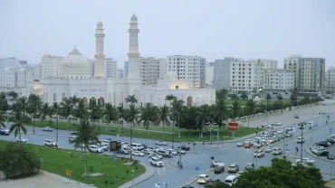 Scenic view of Salalah excursions with waterfalls, mountains, and desert landscapes