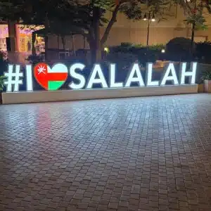 Solo traveler enjoying a guided group tour in Salalah Oman