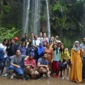 Solo traveler enjoying a guided group tour in Salalah Oman